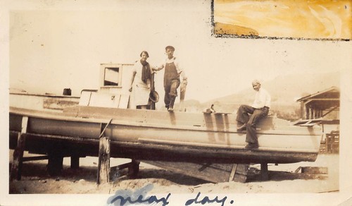 Man woman repairing boat 1910s - man,